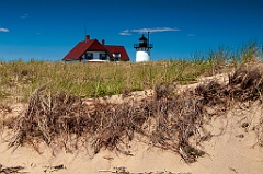 Race Point Lighthouse Surrounded by Sand Dunes on Cape Cod